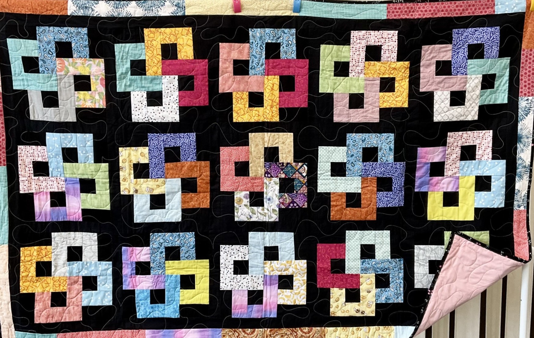 Interlinked multi coloured squares